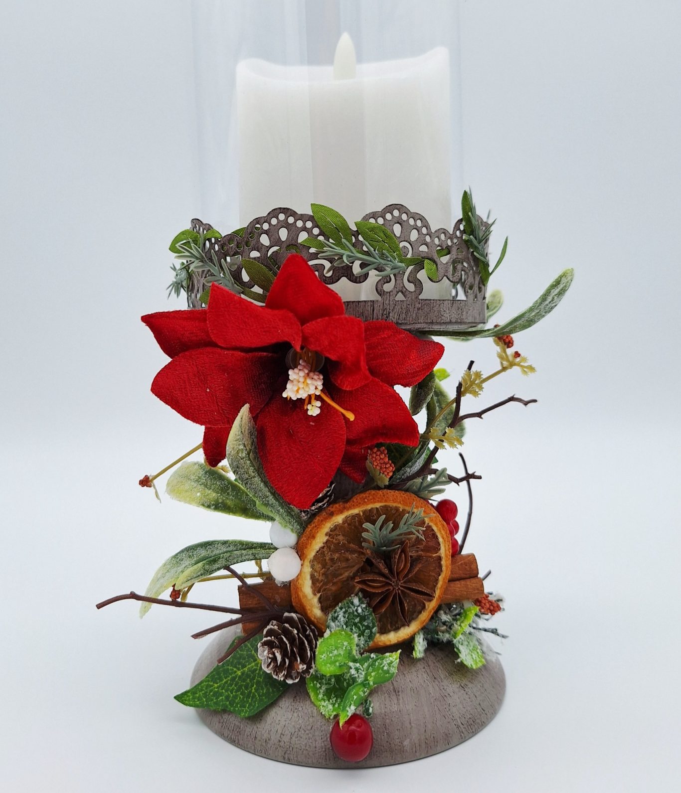Poinsettia on a Metal Filigree Candle Holder